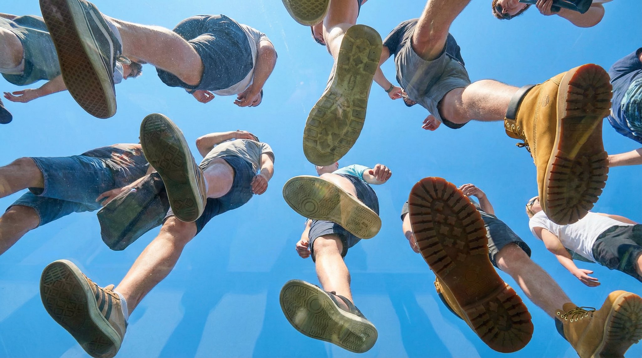 Plexiglass under-foot sky shot: GPT Image 2 prompt AI image prompt example